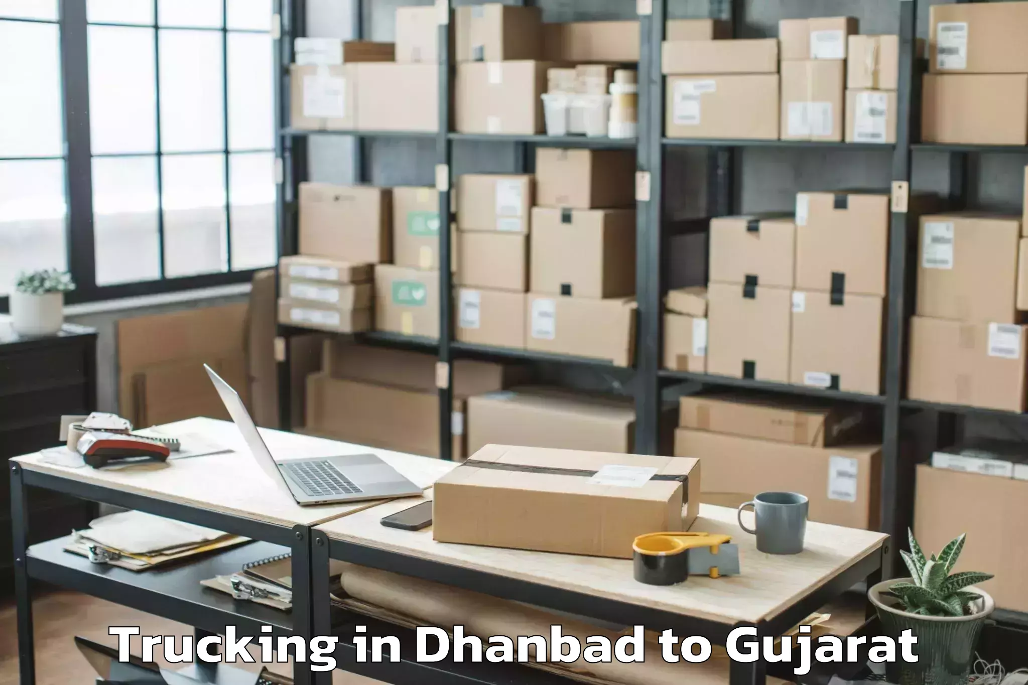 Top Dhanbad to Karnavati University Gandhinag Trucking Available